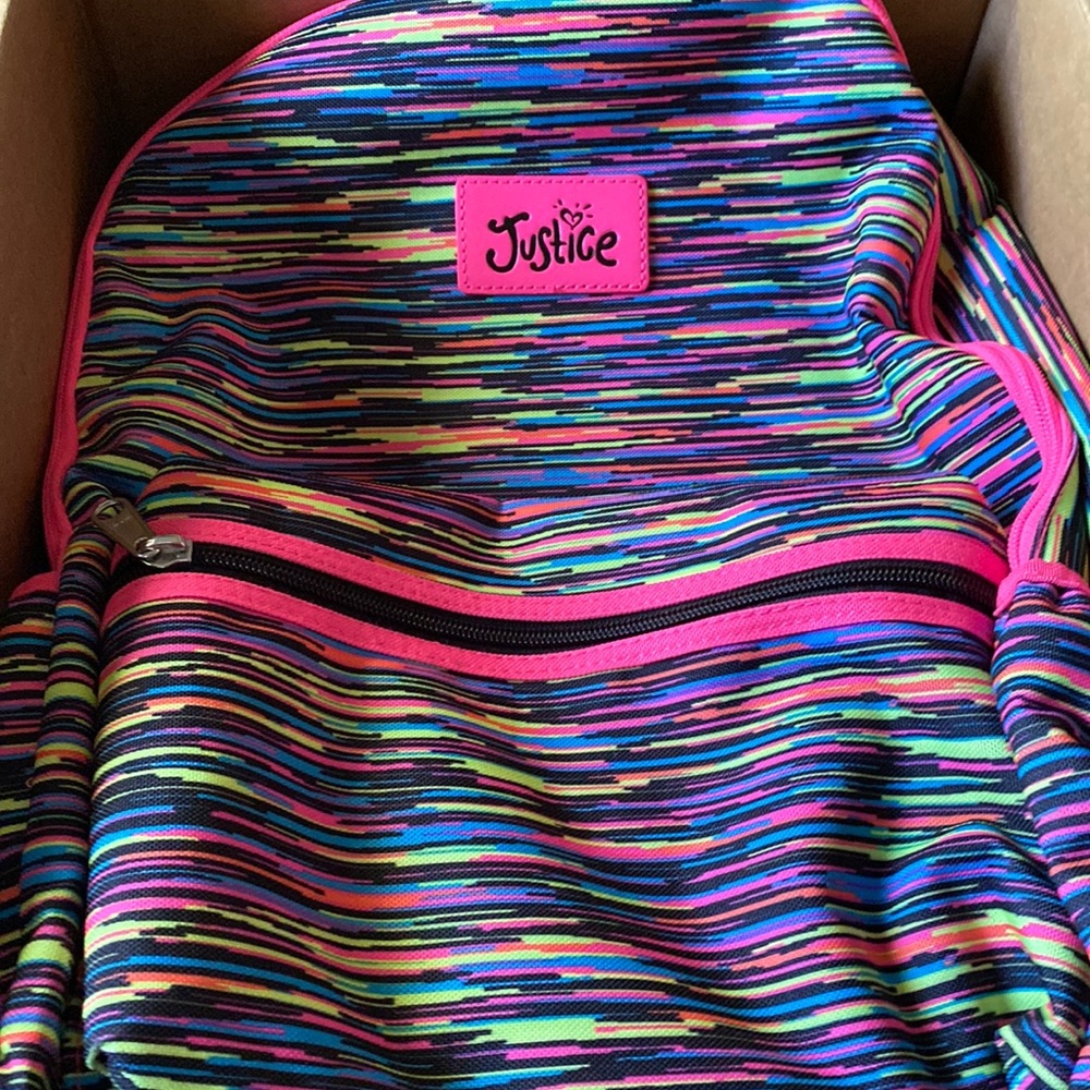 I am selling a brand new justice back pack